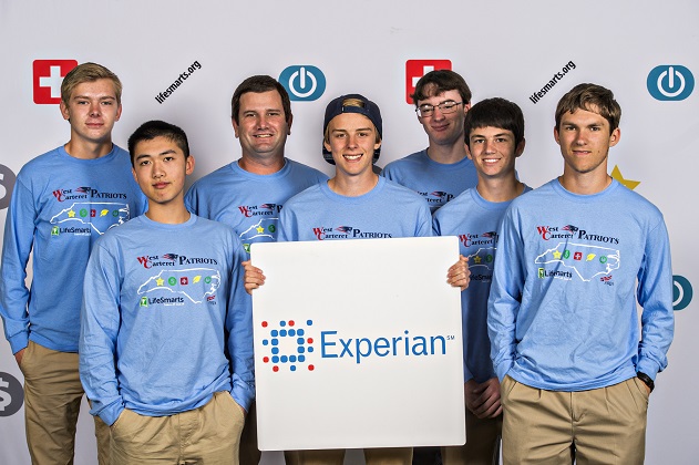 team holding experian sign