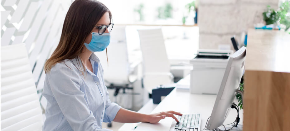 healthcare professional working at computer