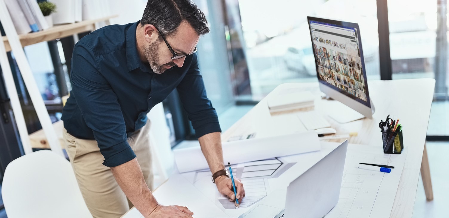 Man Working In Room Behind Glass Wall Whiteboard In Foreground High-Res  Stock Photo - Getty Images