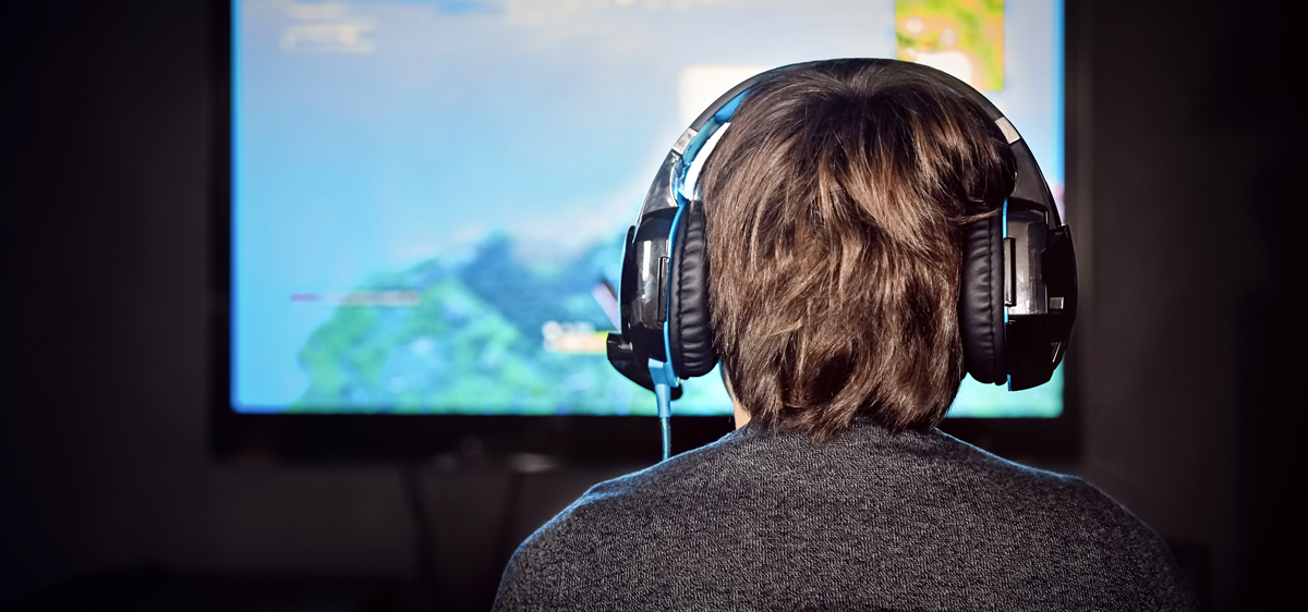 boy on game with headphones