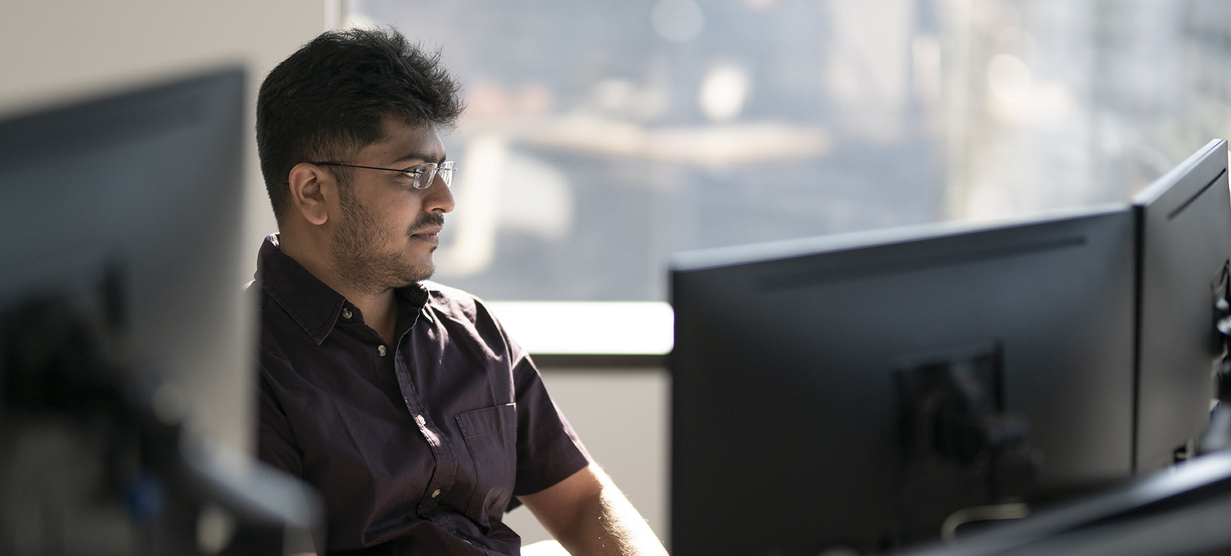 man working on computer