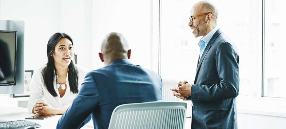 Three business colleagues meeting