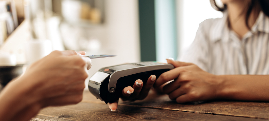 Payment by credit card in the flower shop .