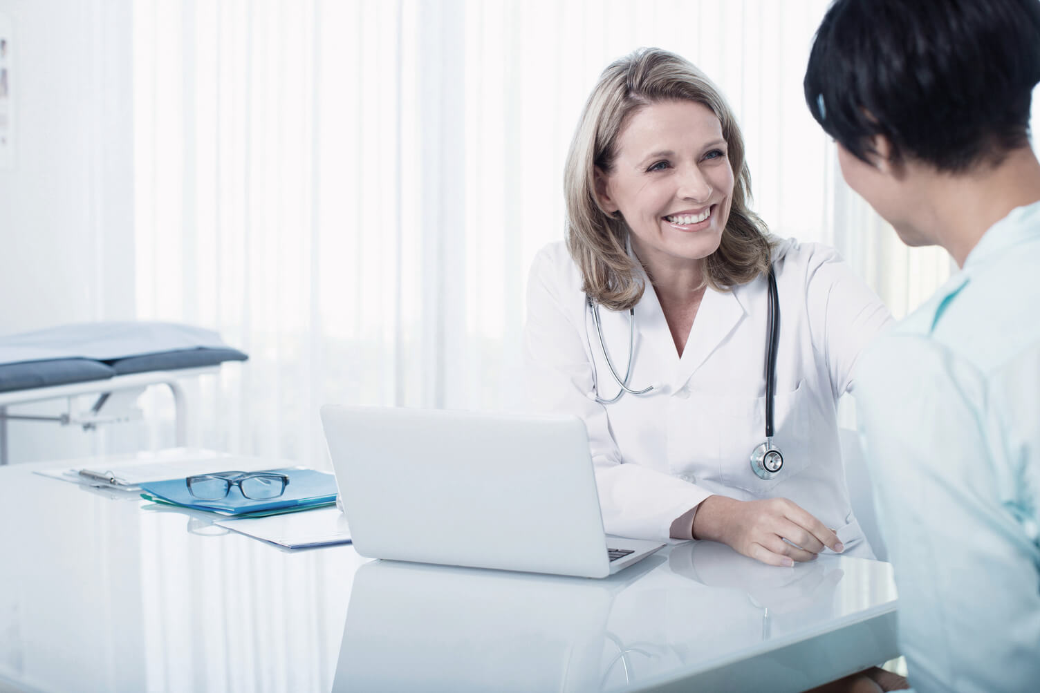 Doctor speaking with patient