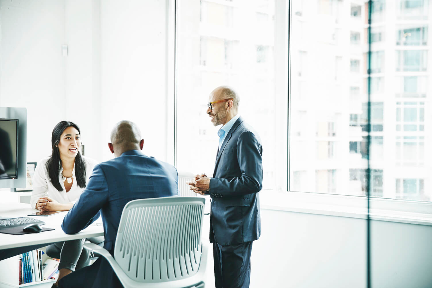 Business colleagues discussing project in office 