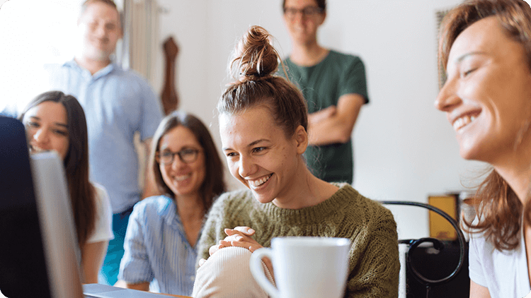 people smiling at screen