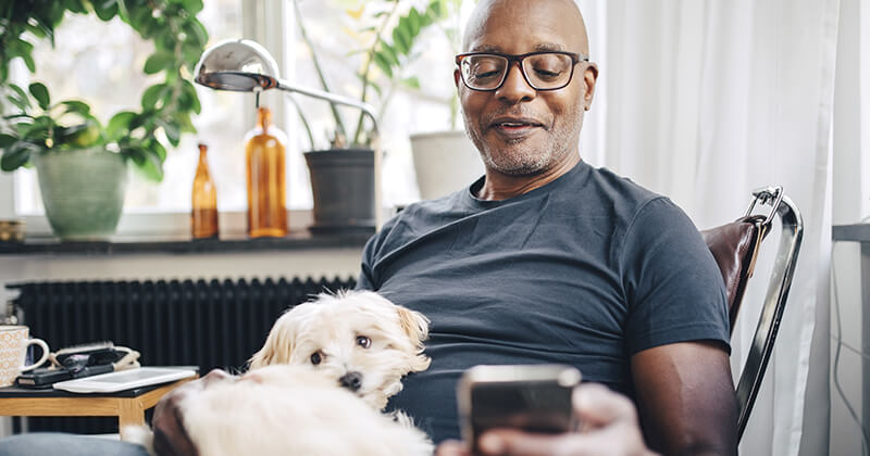 Man using on phone checking his credit union account