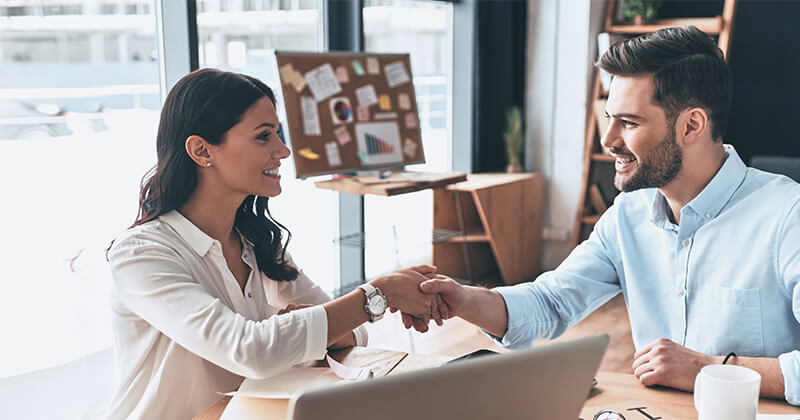 Consultant shaking hands with a customer