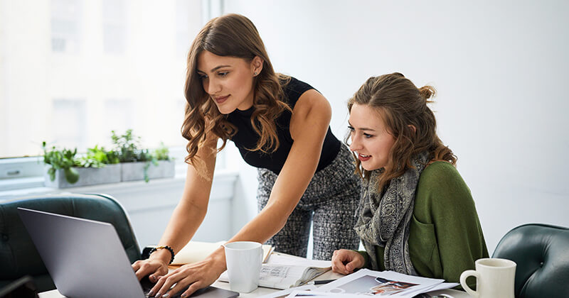 co workers reviewing tenant credit report