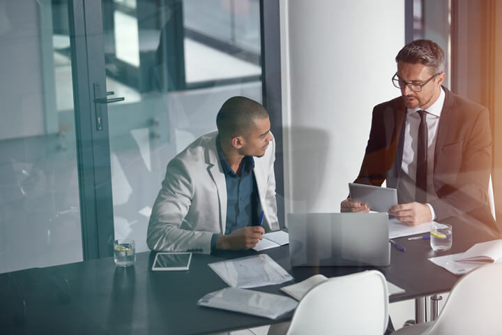 two men at desk