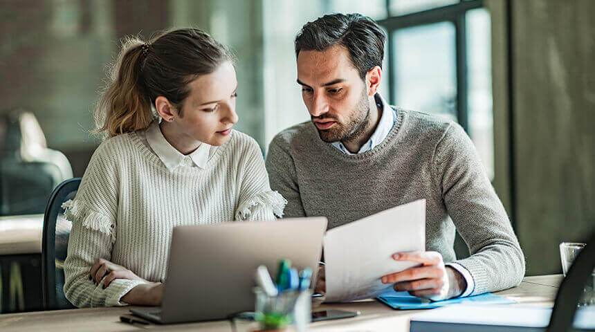 Business colleagues working on reports