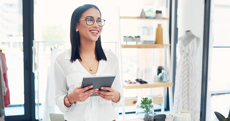 Business woman holding tablet