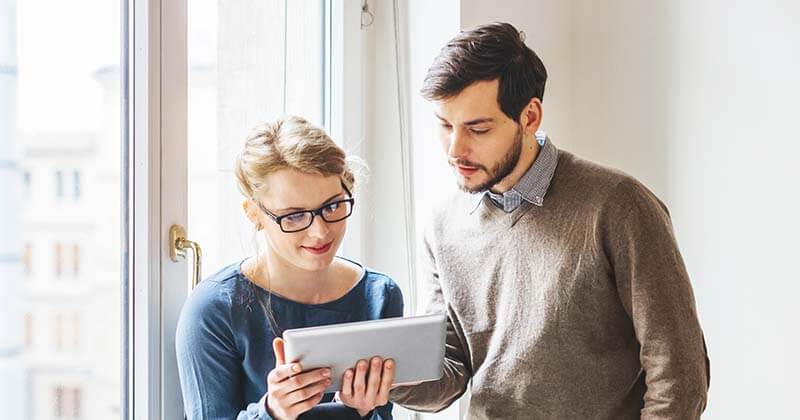 people-looking-at-tablet