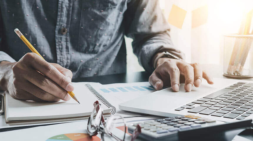 Close up of businessman or accountant hand