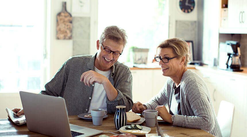 couple breakfast laughing