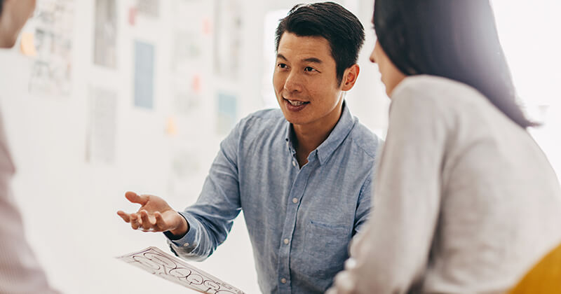 businessman talking to colleagues