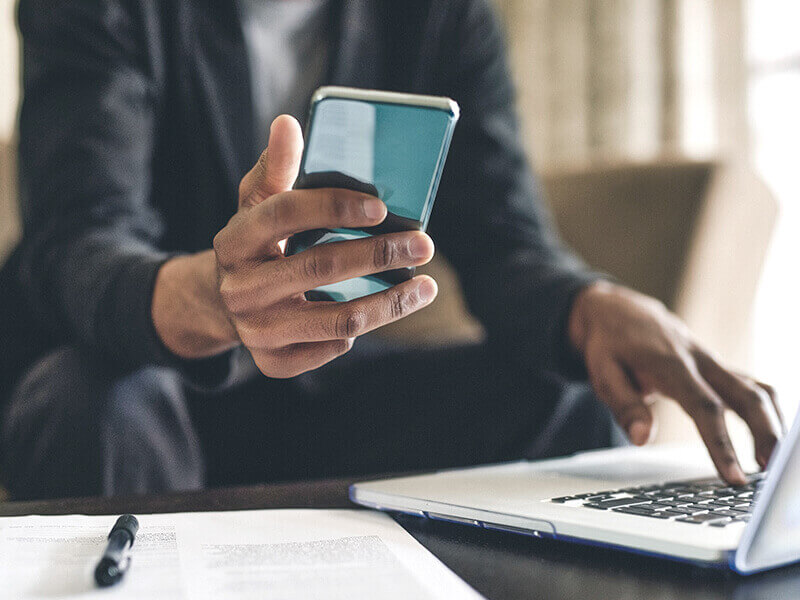 Man looking at smartphone