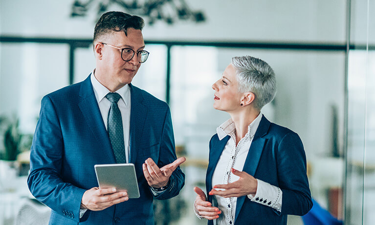 man-and-woman-discussing-benefits