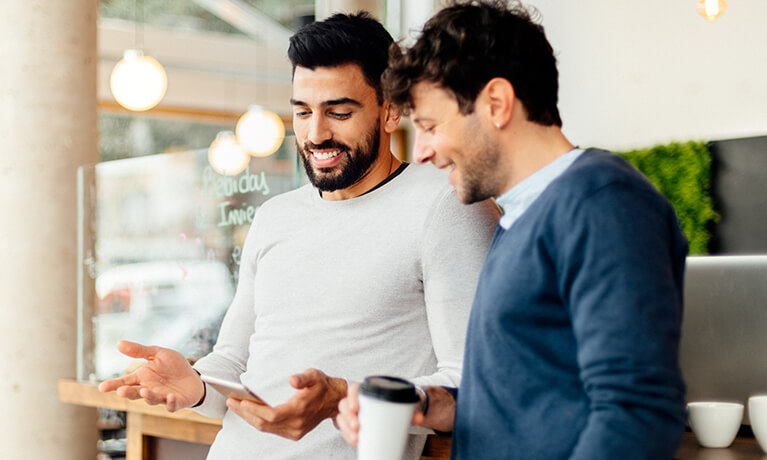 men looking at the phone