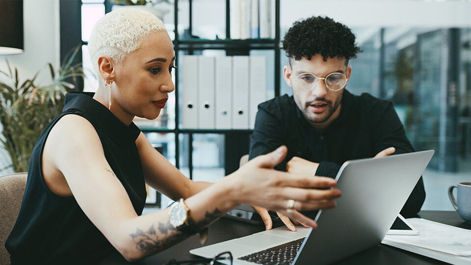 man and woman working together