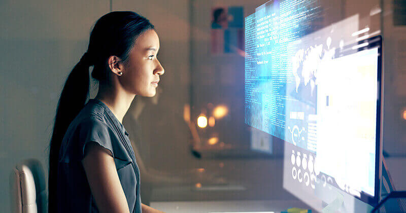 woman processing data on computer