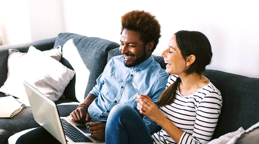 Young couple sitting on couch