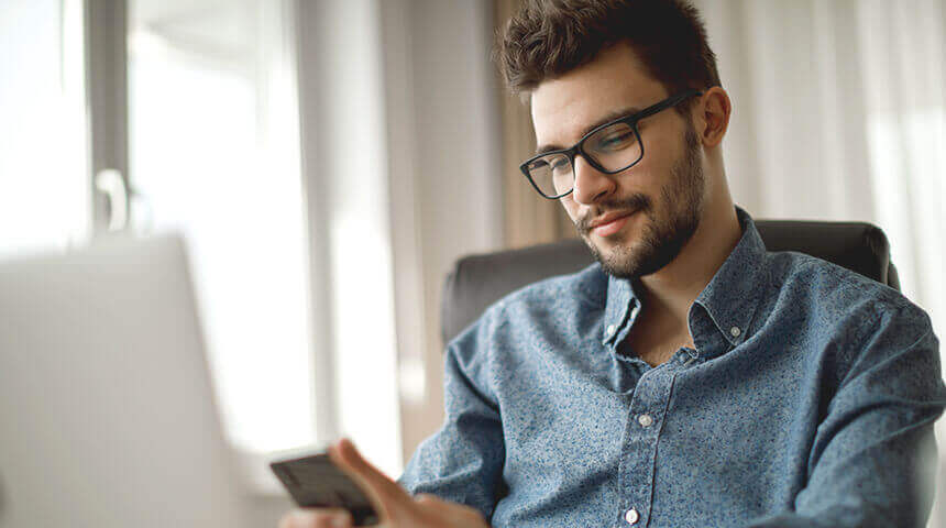 young man using mobile phone