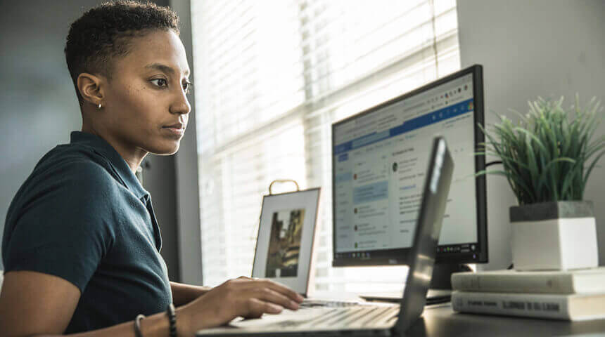 Young woman working on desktop