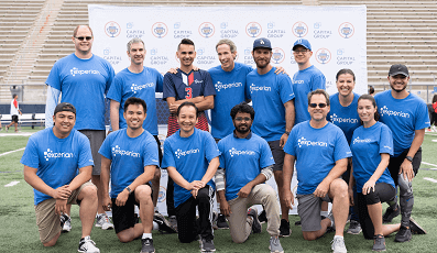 Group of Experian employees posing for the camera at a local volunteering event