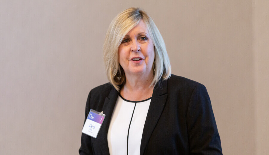 Carol Urton speaking at an Experian event