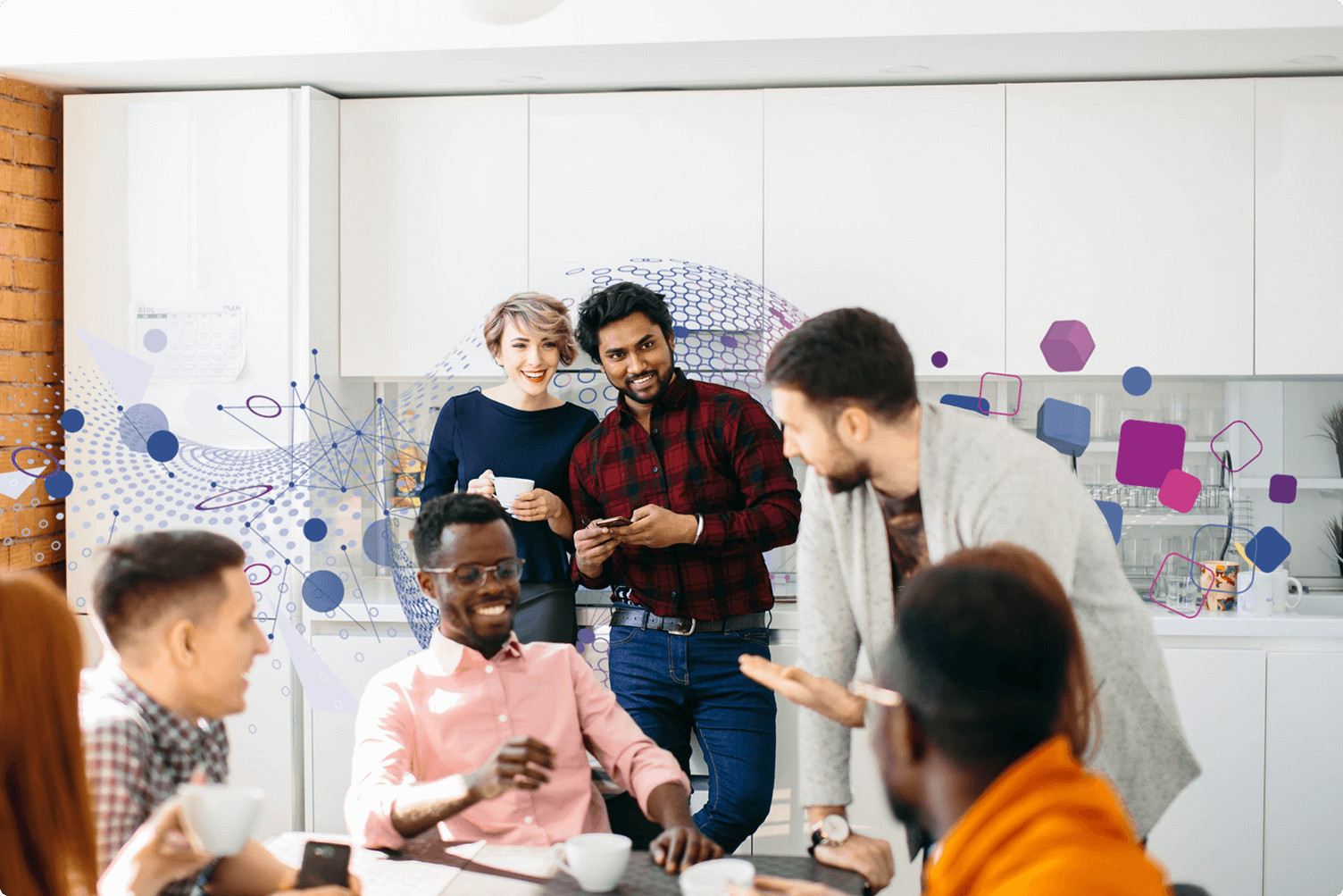 Cheerful man and woman company co-owners standing and observing professional team members having a meeting in a conference room