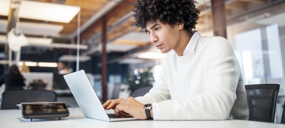 Man looking at laptop