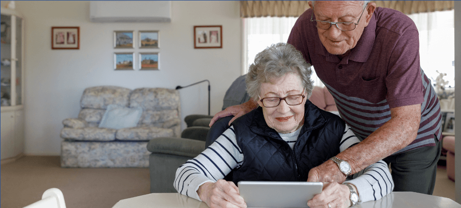 seniors-looking-at-tablet