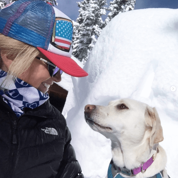 3 of 20 logos - Woman with cap and labrador